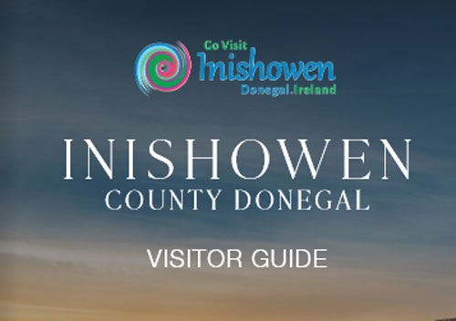 Inishowen County Donegal visitor guide cover with Go Visit Inishowen logo over a dusk sky.
