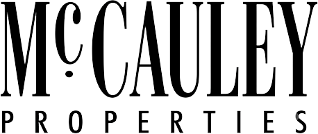 McCauley Properties logo in bold black text on a white background.